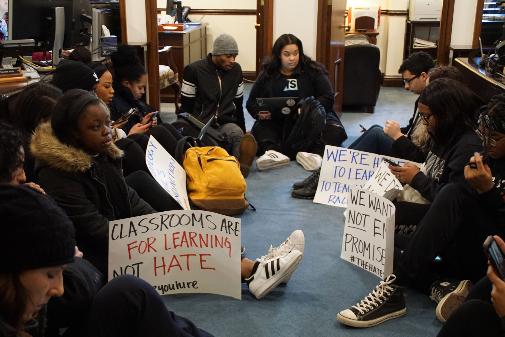 Sit-in sign